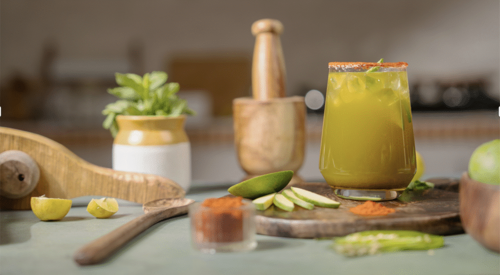 Mocktail ingredients and finished mocktail in a glass